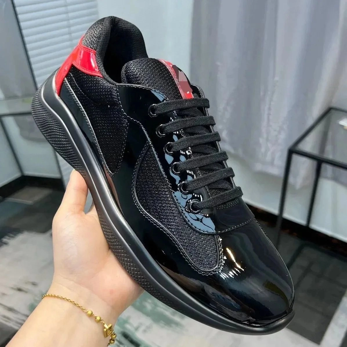 Prada Linea Rossa Black Patent Leather Sneaker with Red Accent