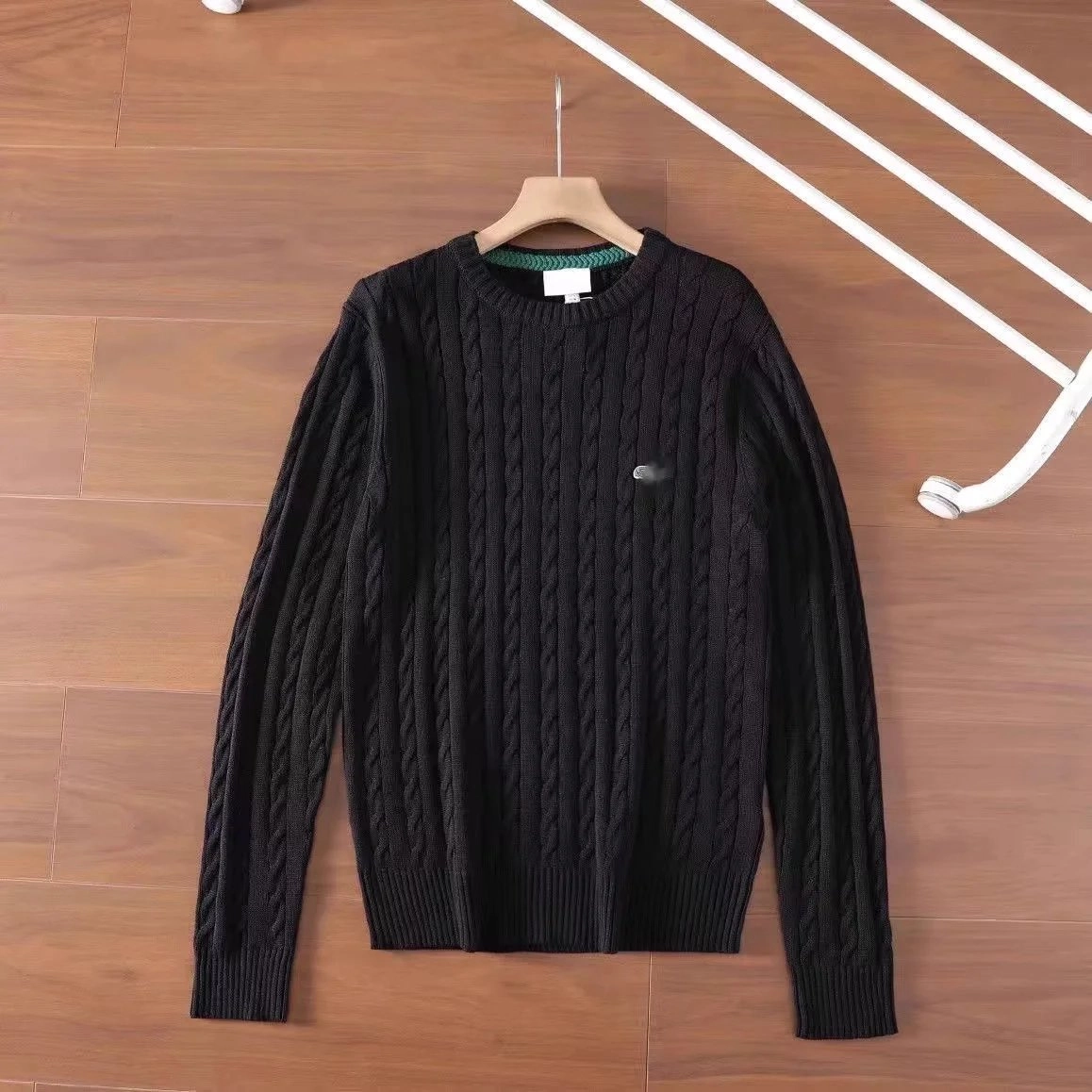 Black Cable Knit Sweater with Green Trim and Logo Patch
