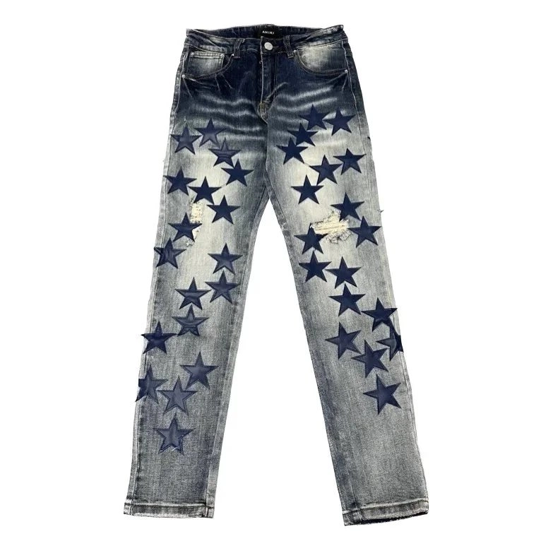 Amiri Star-Print Distressed Denim Jeans - Blue Fade