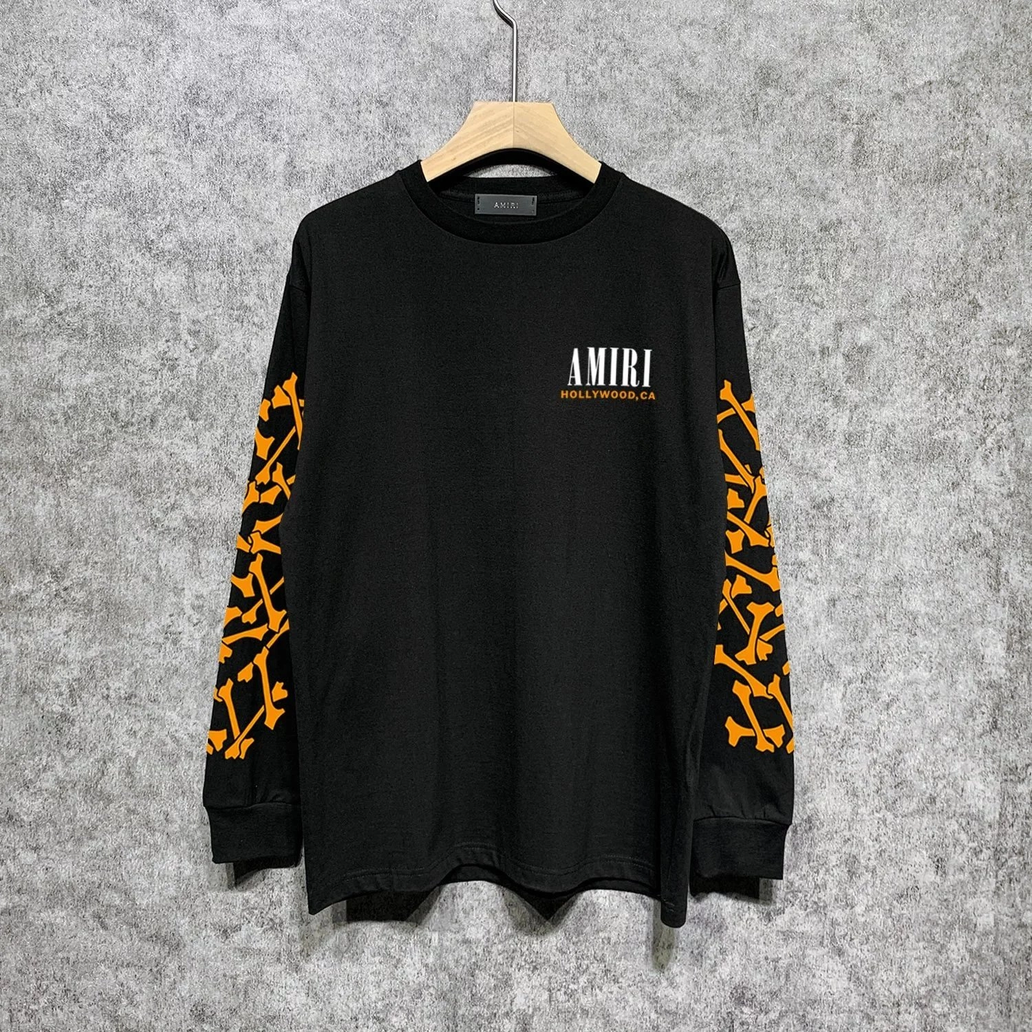 AMIRI Black Long Sleeve Tee with Orange Bone Print Sleeves