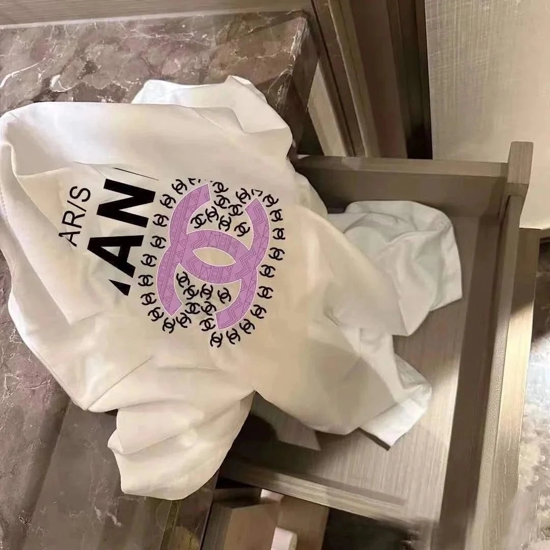 Chanel White T-Shirt with Purple CC Logo and 'PARIS' Text