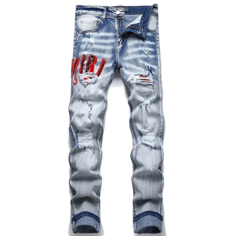 Amiri Distressed Blue Denim Jeans with Red Embroidered Logo