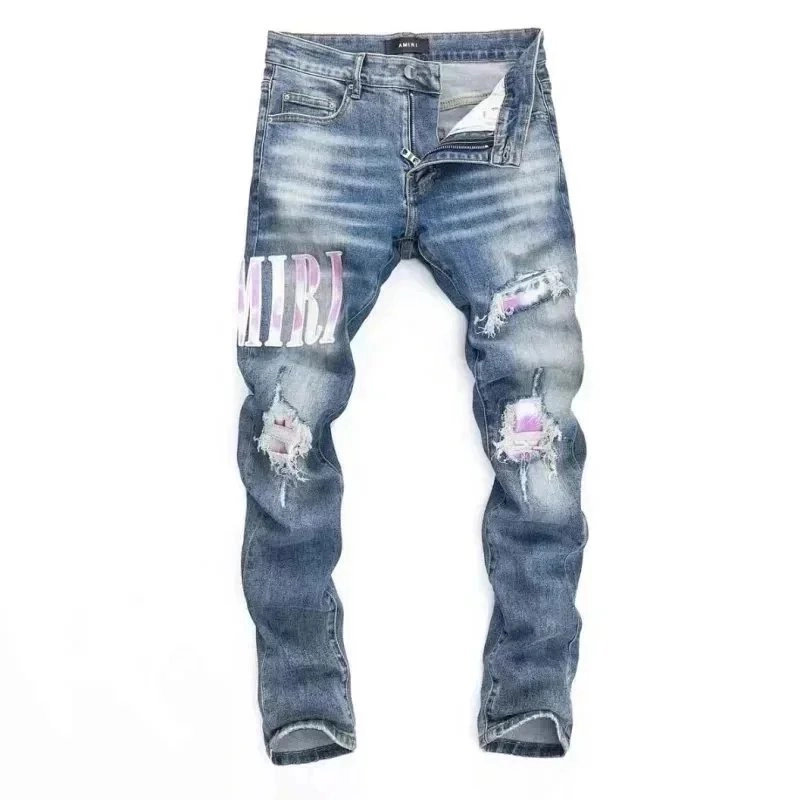 AMIRI Distressed Ripped Denim Jeans with Pink Logo Print