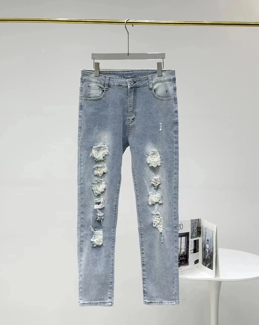 Distressed Light Wash Slim Fit Jeans with Multiple Rips